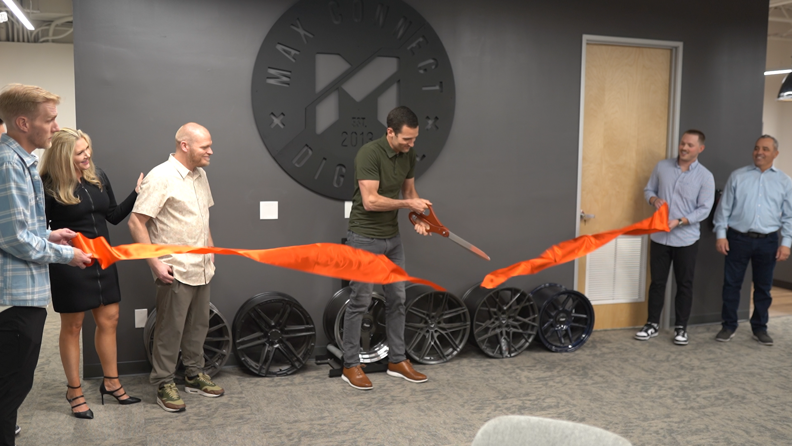 ribbon cutting at the max connect phoenix office